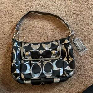 Like new Black and Silver small Coach handbag